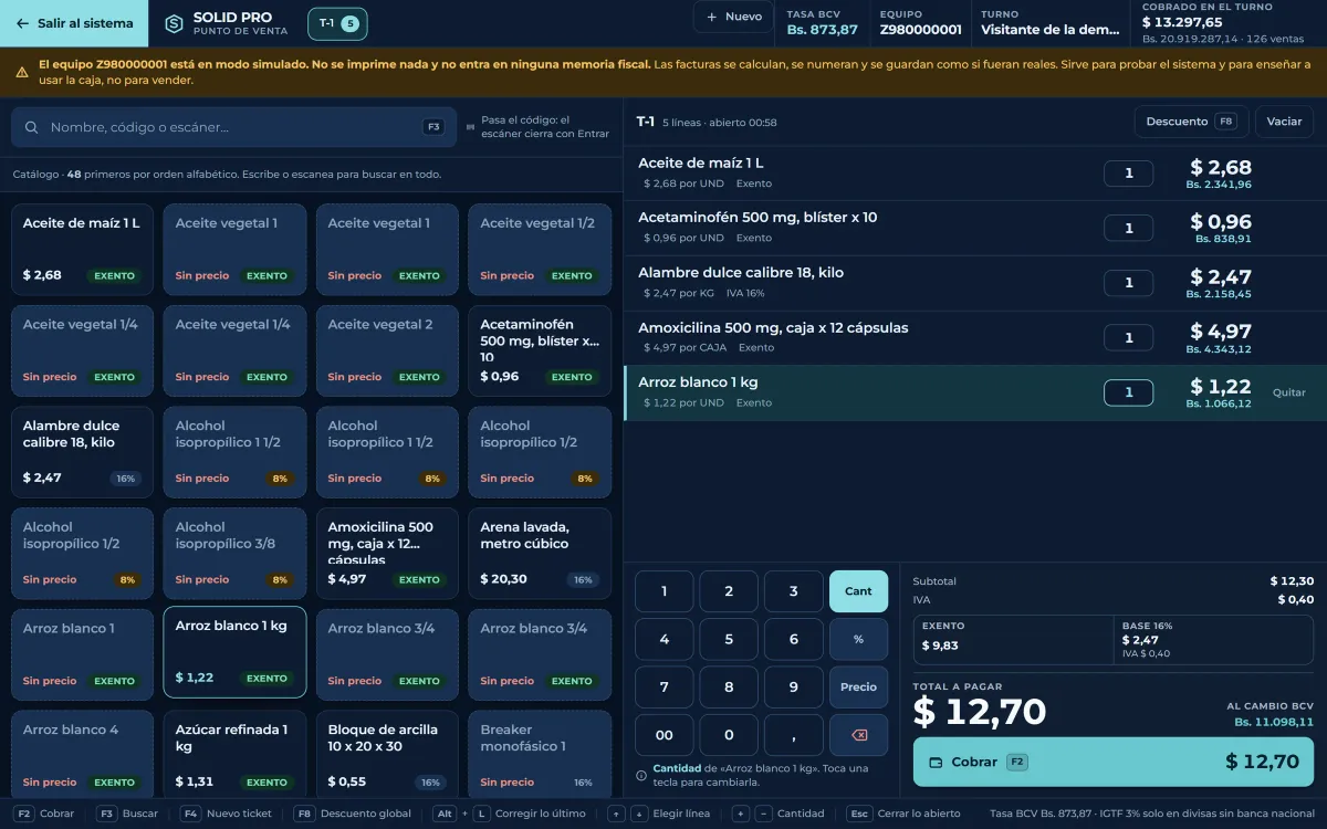 Punto de venta de SOLID PRO con catálogo de productos, un ticket de cinco líneas, teclado numérico, total a pagar de 12,70 dólares y su equivalente en bolívares al cambio BCV